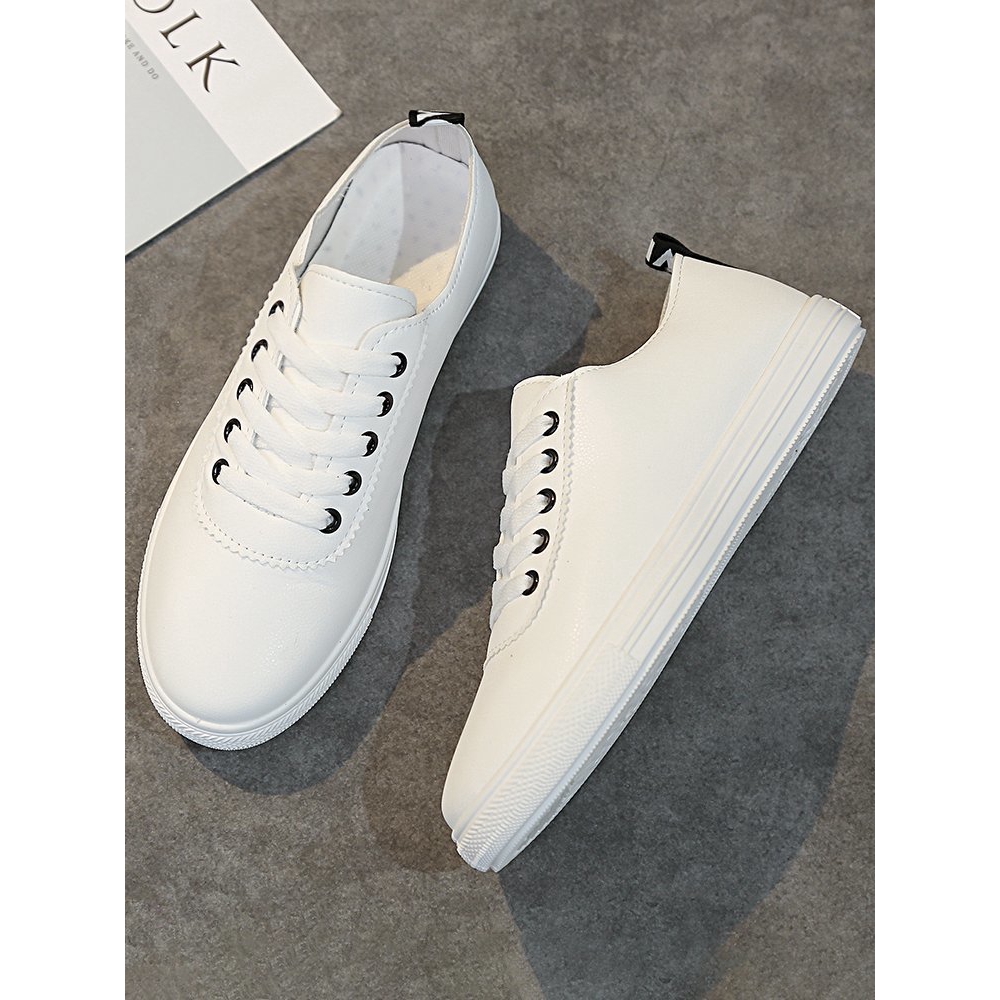 tenis masculino rasteiro branco