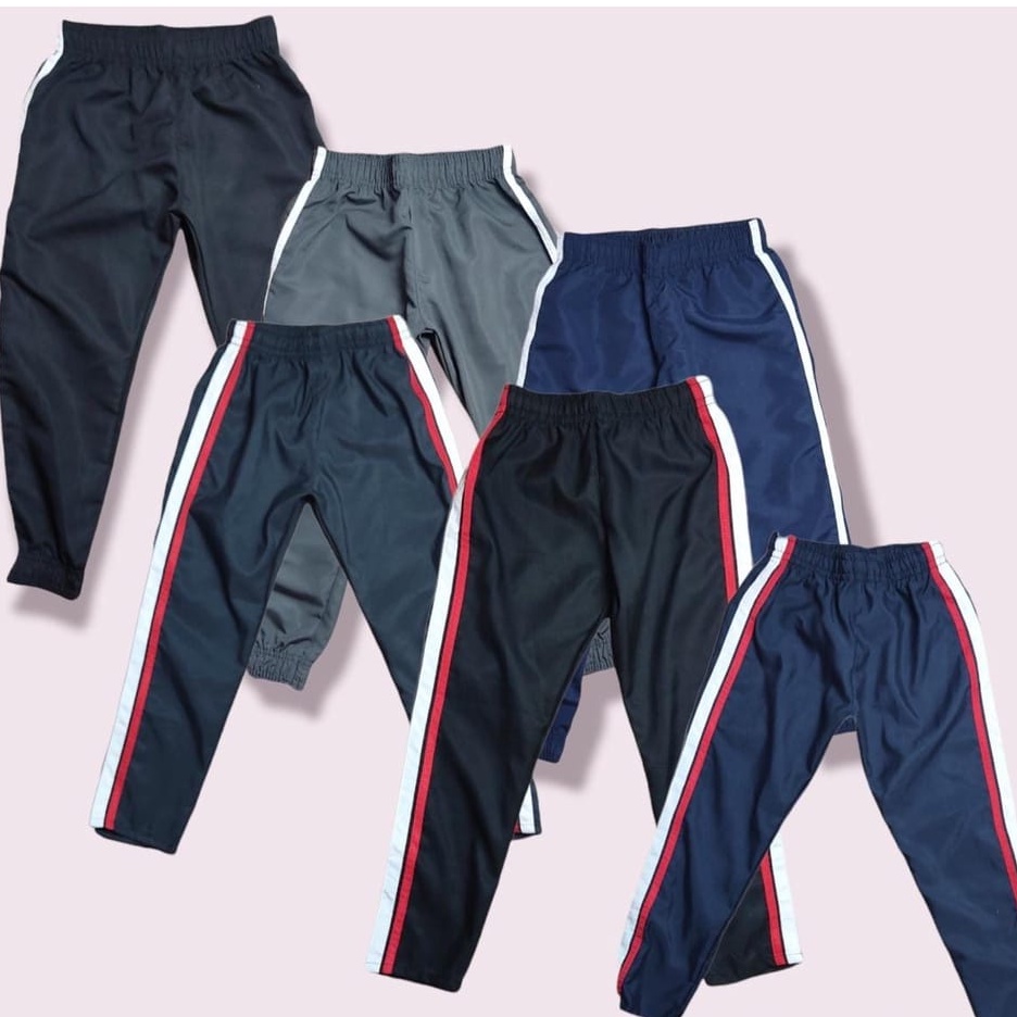 Calça Tactel Adulta com Punho e sem Punho Confortável 𝗟𝗶𝘀𝘁𝗿𝗮𝘀 𝗦𝗼𝗿𝘁𝗶𝗱𝗮𝘀