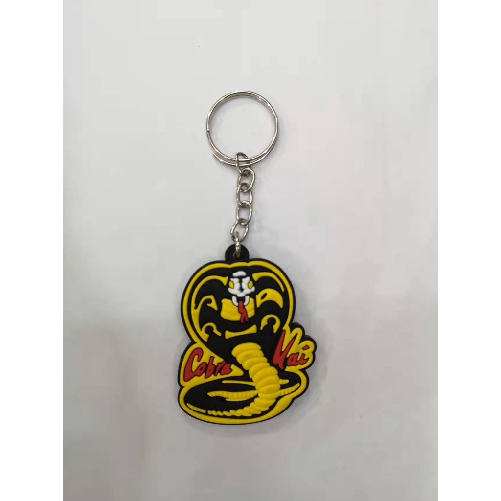 chaveiro Cobra Kai karate kid seriado emborrachado em Oferta na Shopee