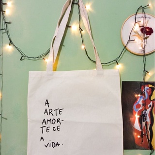 Bolsa Ecológica Ecobag A Arte Amortece a Vida 30x35 ou 35x40 Feita à Mão de Algodão Cru