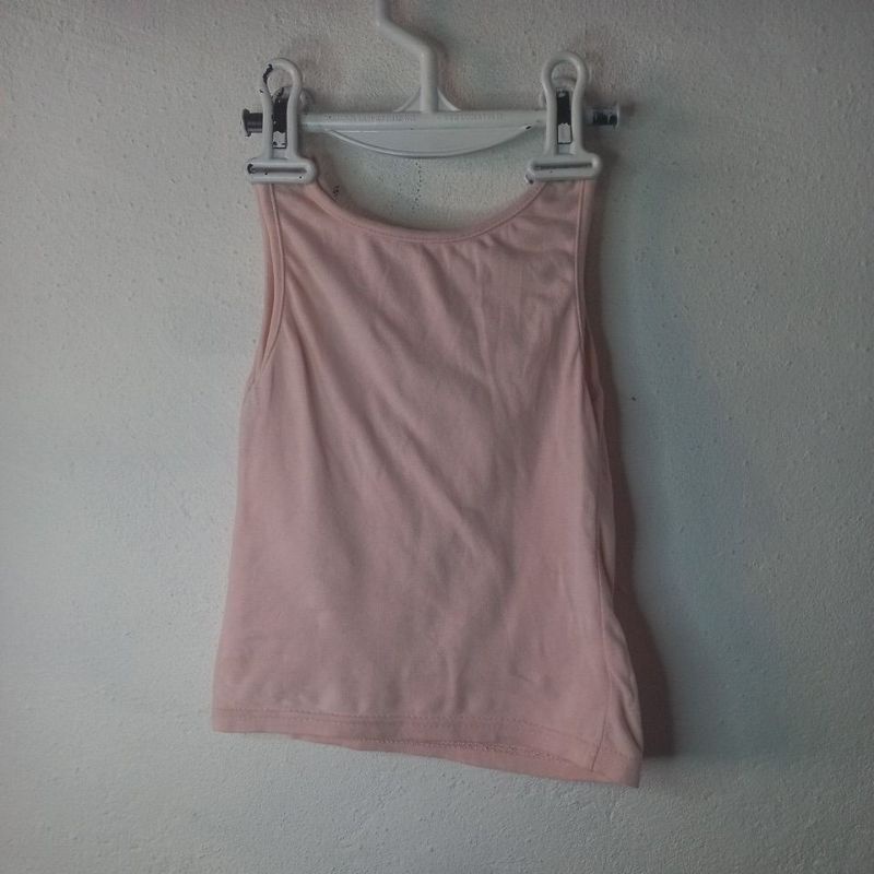 Camiseta rosa boneca infantil usada