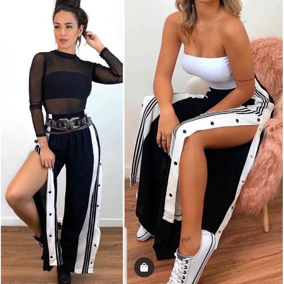 calça pantalona com botoes na lateral