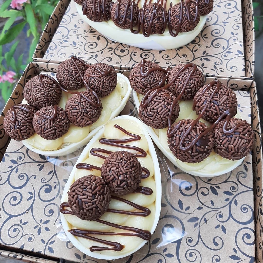 20 Caixas Ovo Colher trio 3x100g em Oferta na Shopee