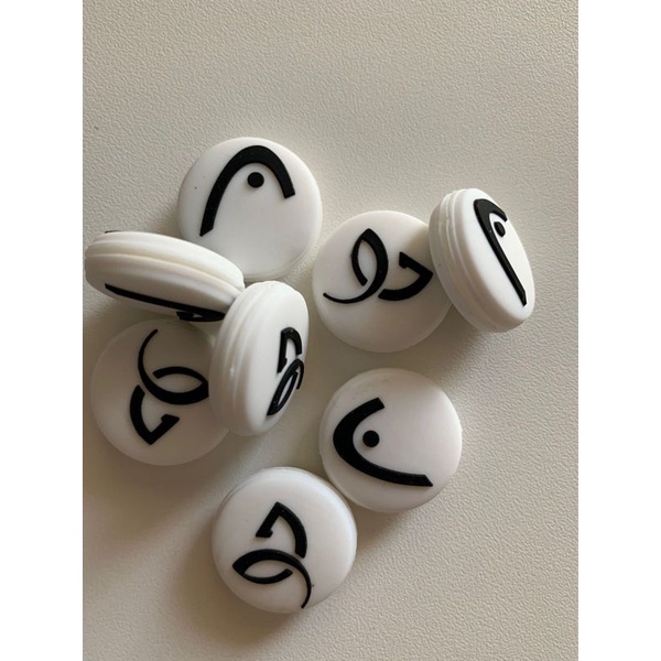 2 Antivibradores Head Novak Djokovic branco para raquete de tênis = 2 unidades