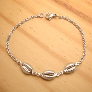 Pulseira em aço inox antialérgico com três pingentes de búzios duplos - Pulseira feminina