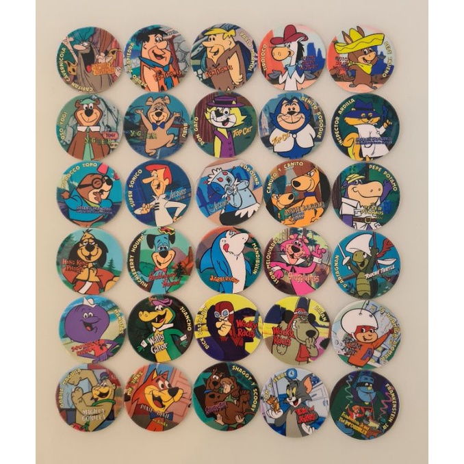 Coleção de Tazos Hanna Barbera. (Tom e Jerry, Flinstons, Jetson, Scooby Doo entre outros)