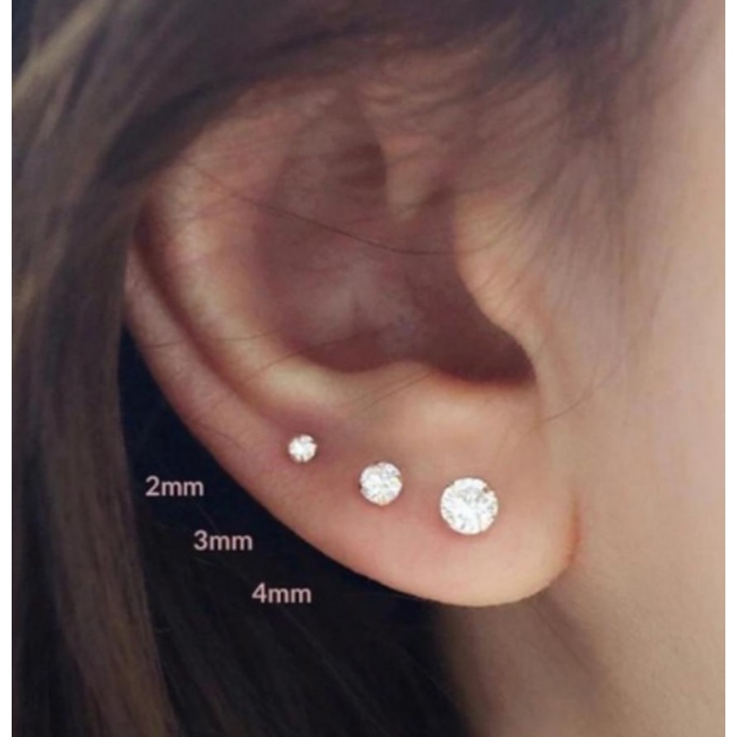 Cartela com 3 pares de brincos antialérgicos de silicone para 1,2 e 3 furos.Cartela com 3 pares de b em Oferta na Shopee