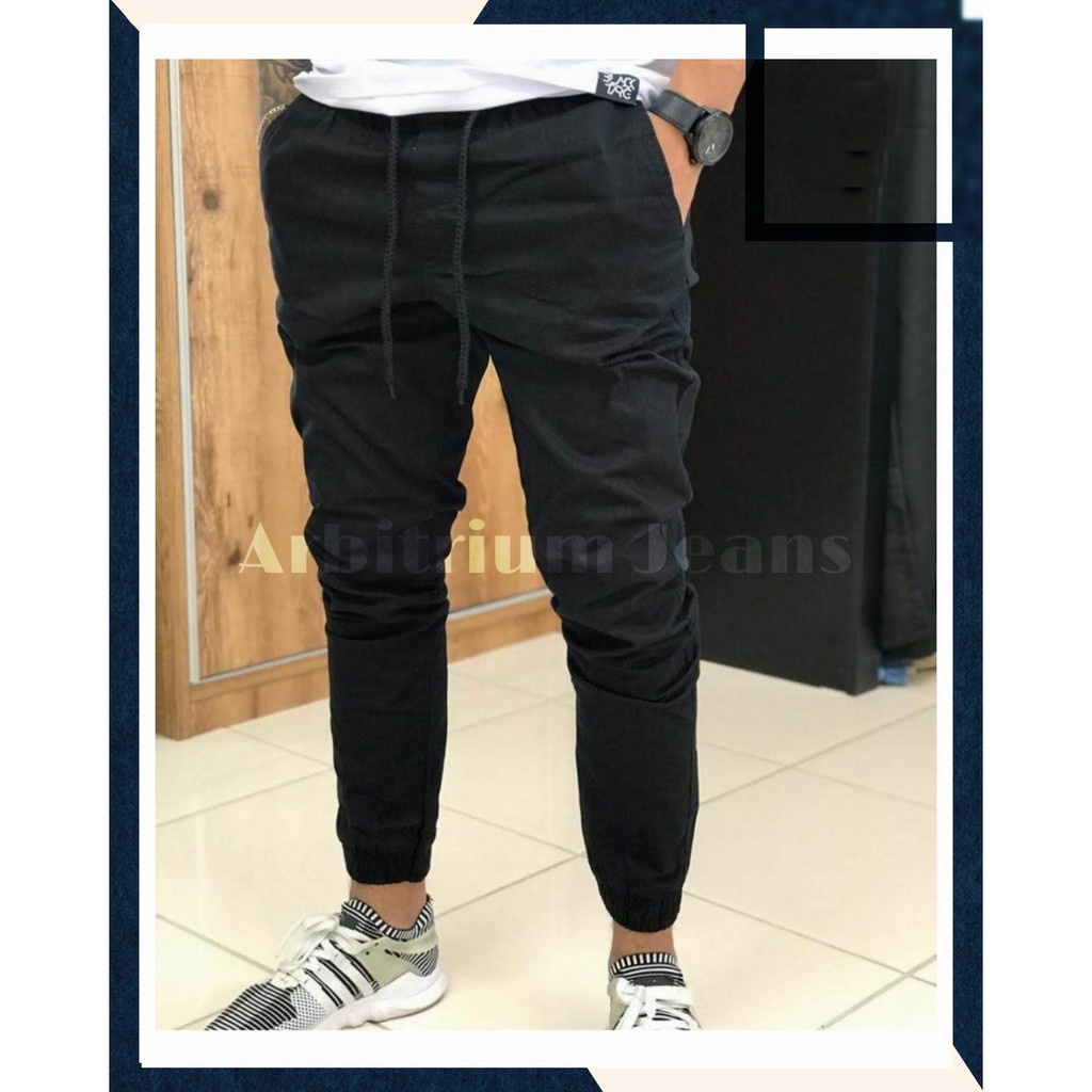 calça jeans preta rasgada feminina