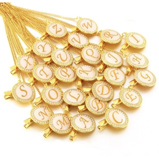 Prendedor de chupeta ou bico dourado de luxo com strass e personalizado com a letra inicial do nome em Oferta na Shopee