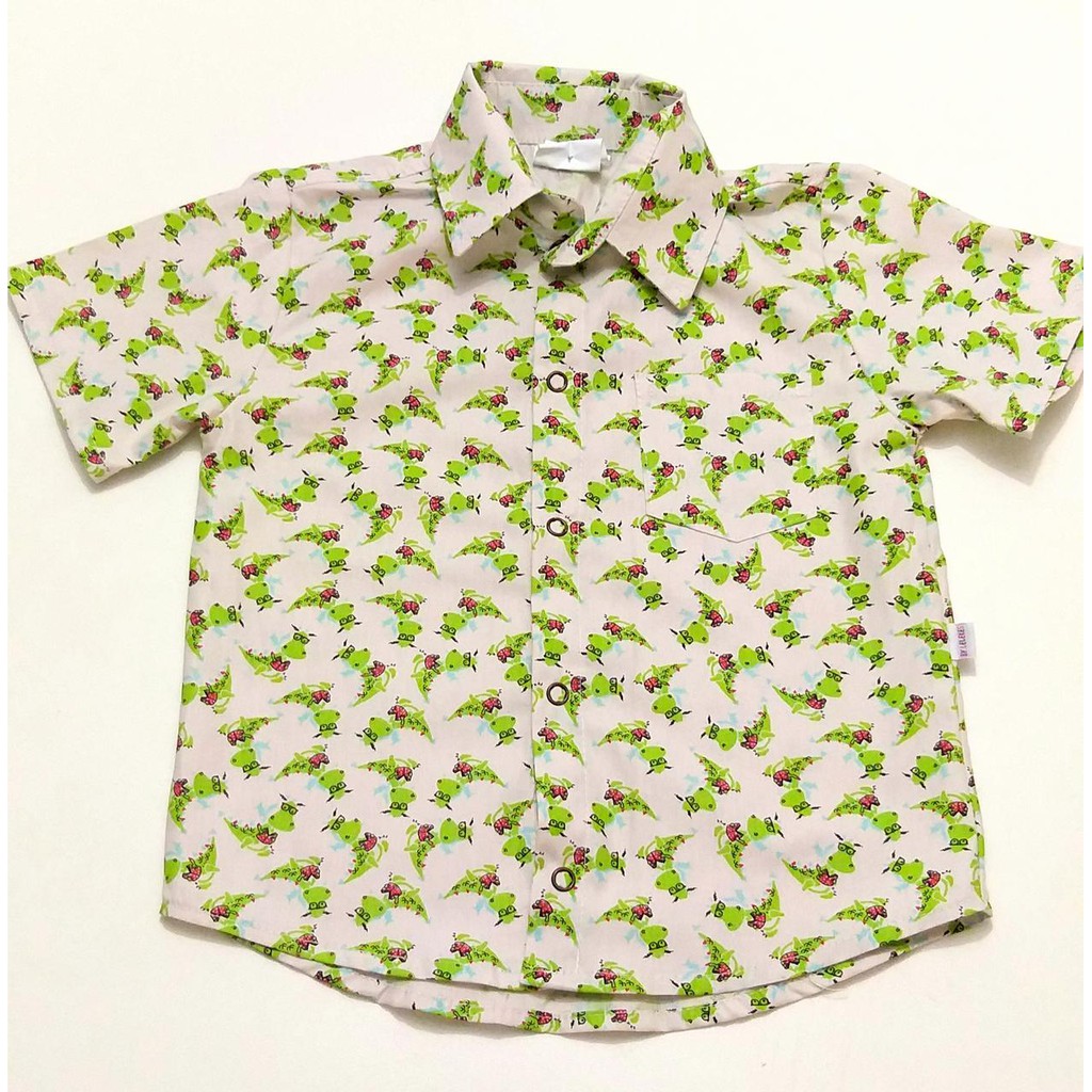 Camisa Social Estampada Dinossauro Manga Curta Infantil. Quer deixar seus pequenos com look Super estiloso? Conheçam nossas camisas By Lelekes!