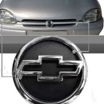 Emblema GM Grade Para-choque Corsa Wind 95 96 97 98 99