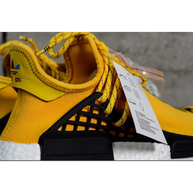 adidas human race amarelo
