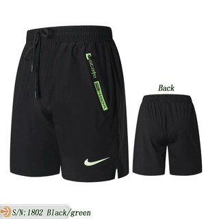 short da nike com bolso