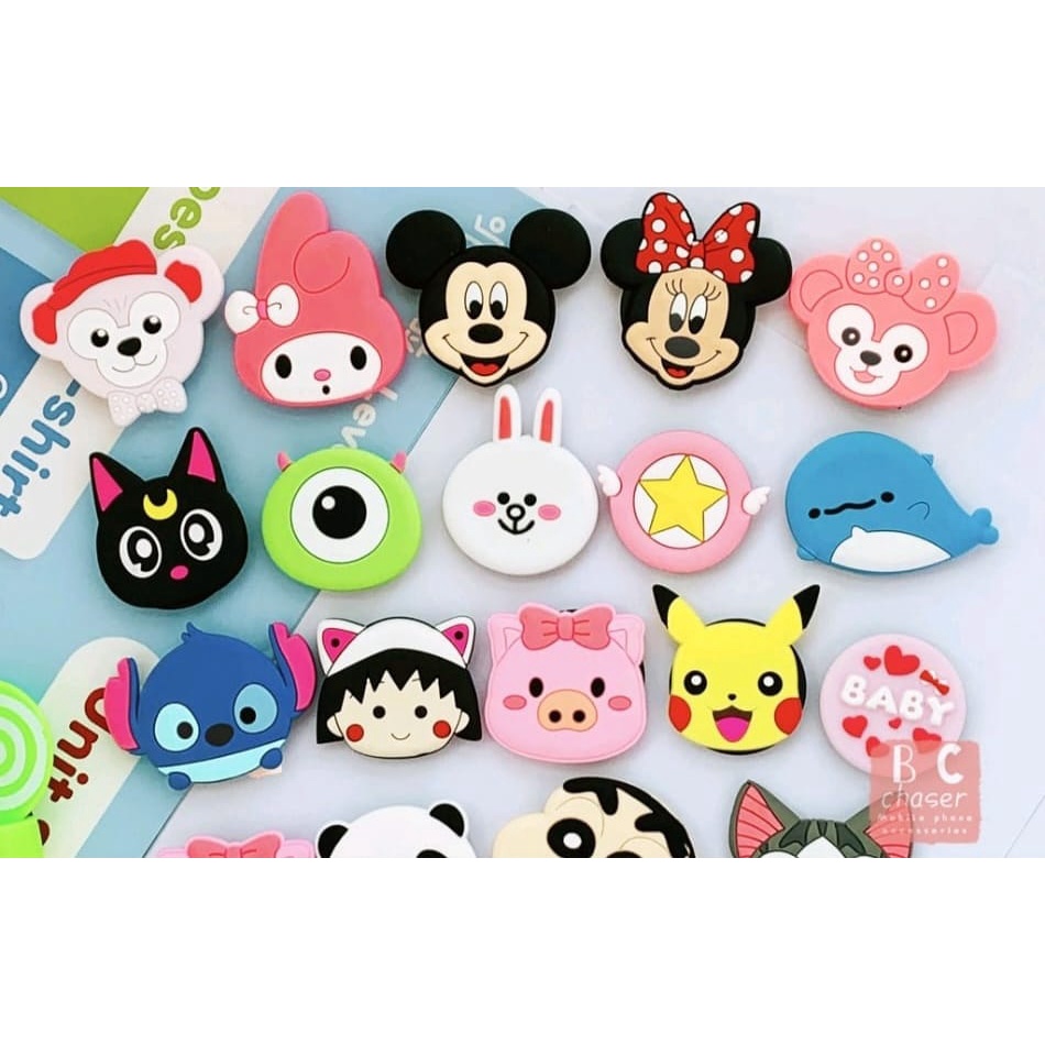 Suporte Celular Dedo Personagens animados - QUEIMA DE ESTOQUE em Oferta na Shopee