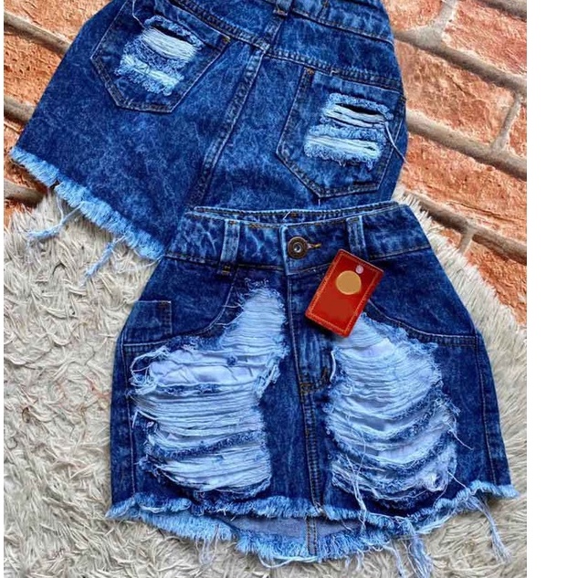 Saia Feminina Jeans Carnaval Destroyed Desfiado na Perna Moda Blogueira Ultima Moda Super — R$ 38,80 em Shopee, 40% OFF