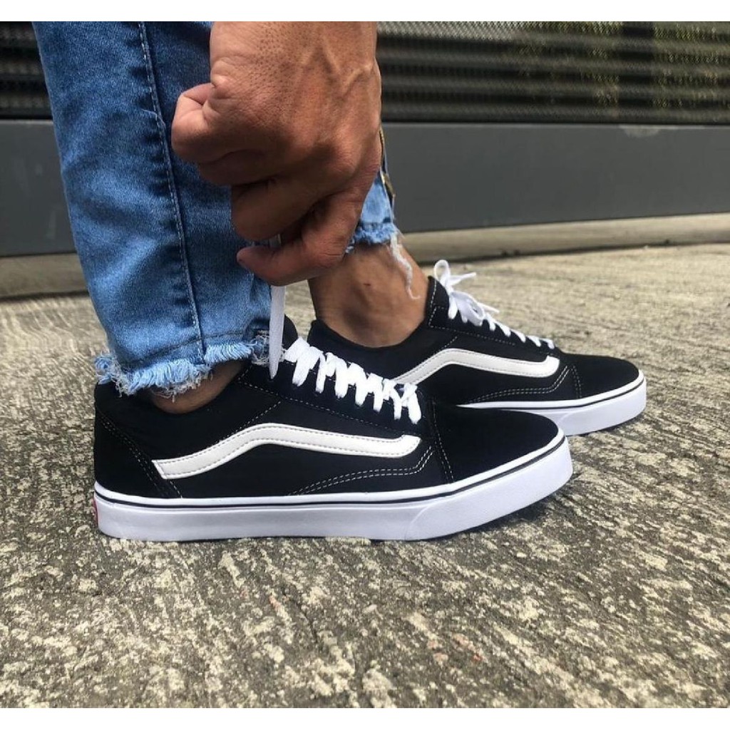 vans preto com listra branca