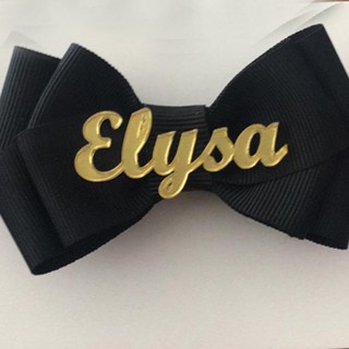 Nome simples em acrílico com 4 cm de comprimento (ideal para laços). em Oferta na Shopee