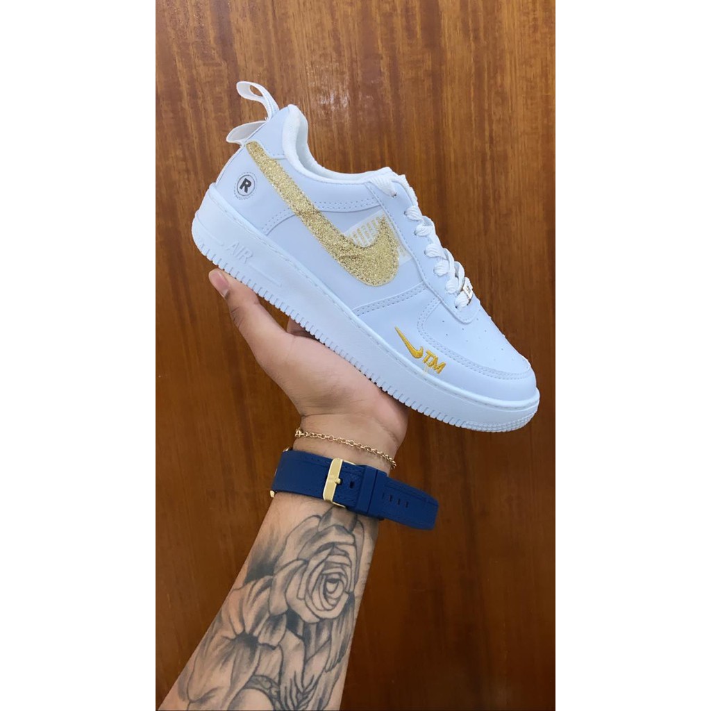 tenis nike dourado com glitter