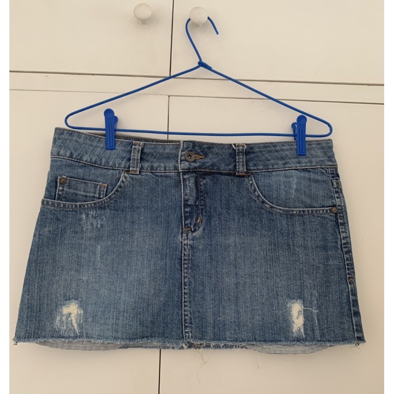 Injection retail dictionary Mini saia jeans curta azul M. Officer detalhe no bolso cintura baixa -  Tamanho 38 | Shopee Brasil