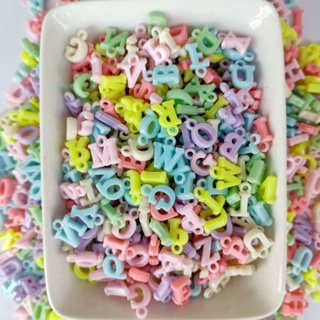 Miçanga Pingente Letras 14x9mm - Aprox 200 e 500 peças em Oferta na Shopee