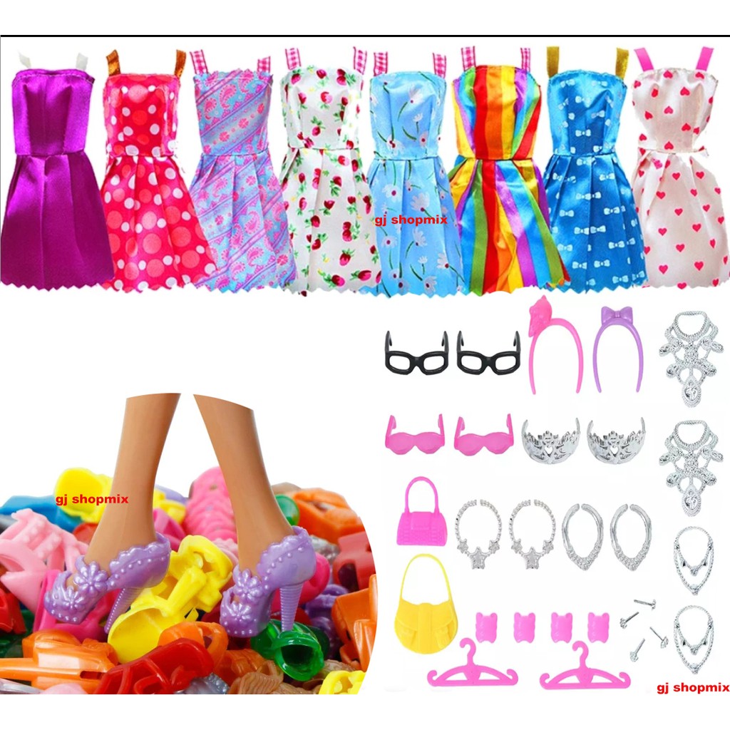 Roupa Boneca Barbie kit 42 peças AcessóriosJoias Vestidos Roupinhas oi