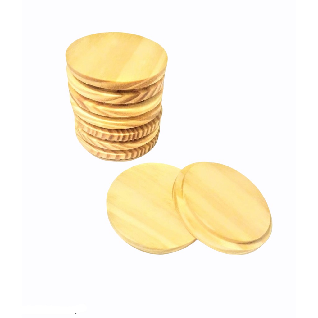 5 Tampas em madeira de Pinus com 10,2 cm de diâmetro na parte de cima e 9,7 cm de diâmetro no encaixe tardadas com óleo mineral