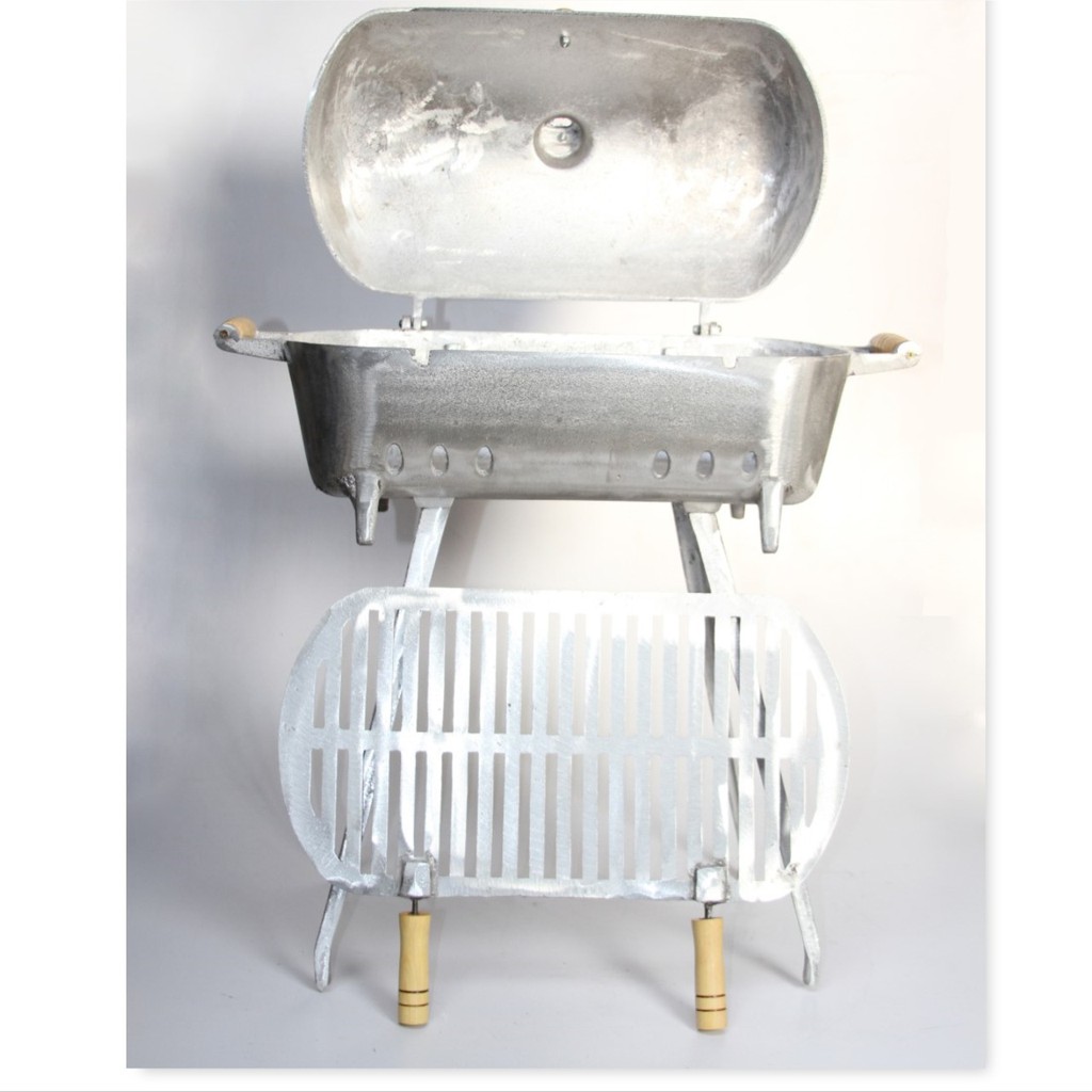 churrasqueira a bafo grande feita em alumínio com par de pes inclusos