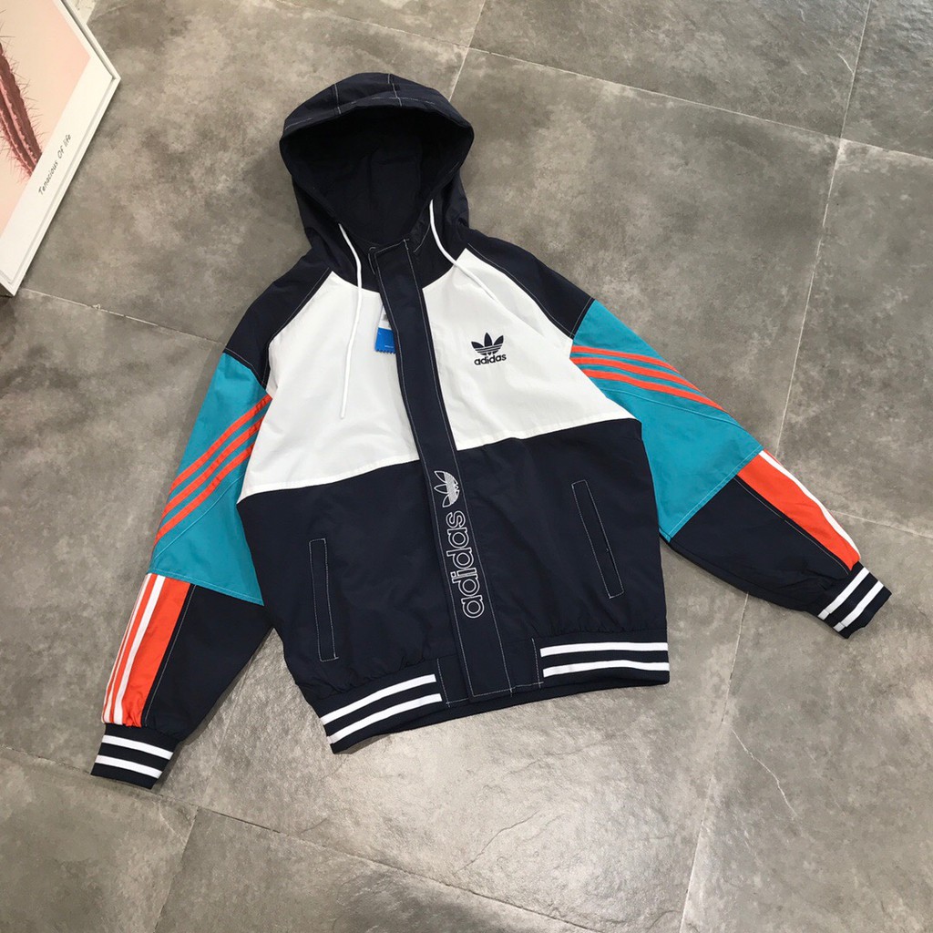 jaqueta corta vento adidas cinza