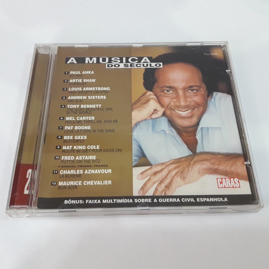 CD De Música Usado A Música Do Século Paul Anka  Pop Volume 23 Com 12 Músicas Revista Caras