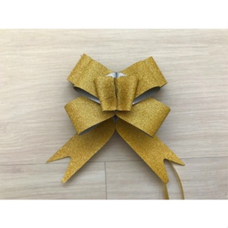 laço facil dourado brilhante 18x39 com 50unidades em Oferta na Shopee