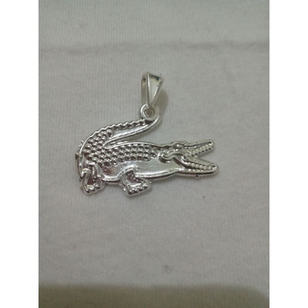 lacoste silver crocodile Cinosural International School