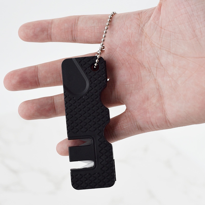 Afiador tático para facas e canivetes. afia e alinha o fio da faca, ideal para caça, pesca ou camping.