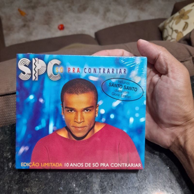 Box CD SPC Só Pra Contrariar incluindo santo santo Dueto com Glória Stefan edição limitada 10 anos Só Pra Contrariar 2