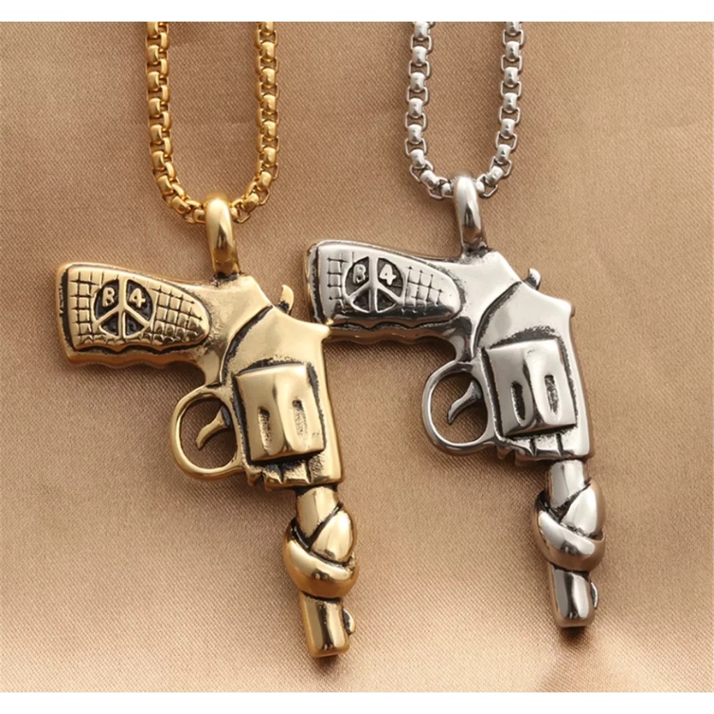 Corrente com Pingente Colt Magnum 357 com o cano amarrado em um nó