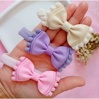 kit Laços Bella Pompom, Faixinhas para bebês e meninas em Oferta na Shopee