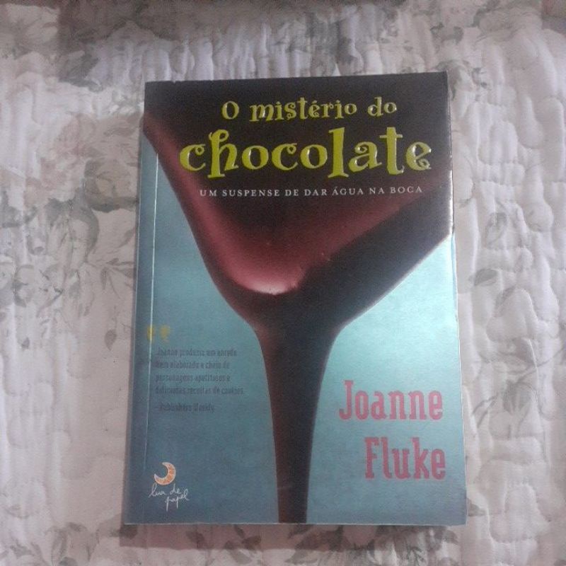 O mistério do chocolate Um suspense de dar água na boca Joanne Fluke