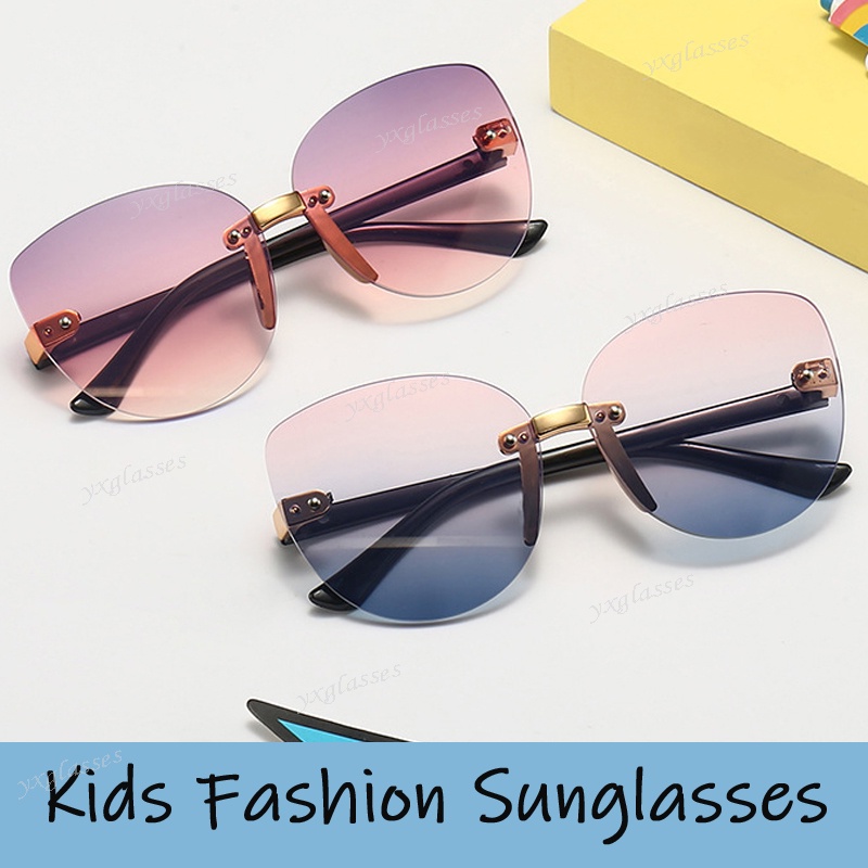 Coreano Crianças Óculos De Sol Olho De Gato Moda Oval frameless Para Meninos Meninas UV400 em Oferta na Shopee