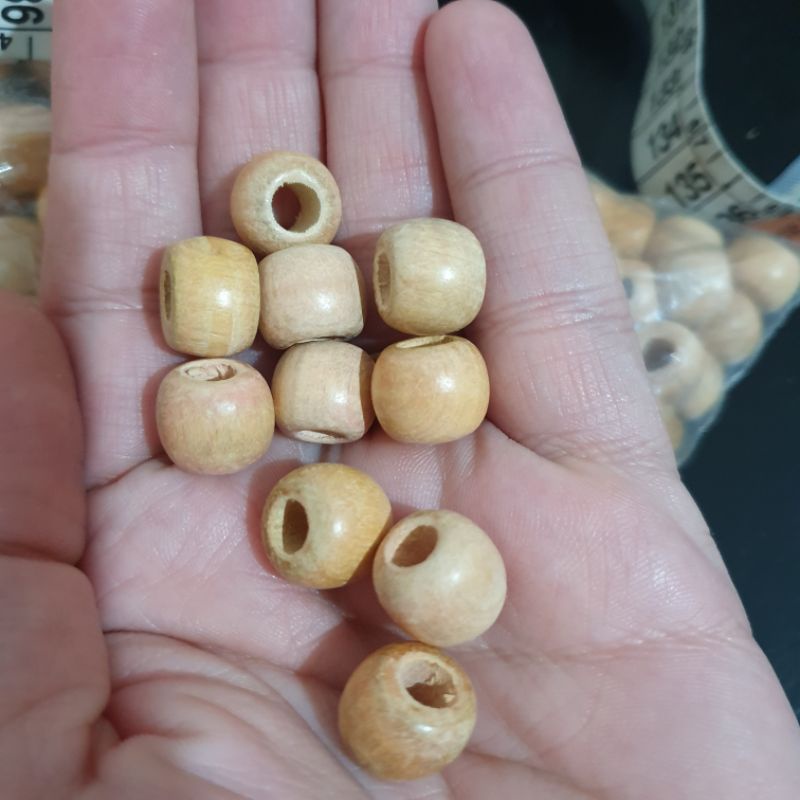 Kit 20 Bolinhas PP (contas) de Madeira 1,1cm para Macramê em Oferta na Shopee