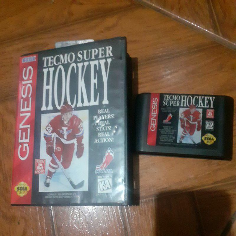 Cartucho de Mega Drive Tecmo Super Hockey original com caixa.