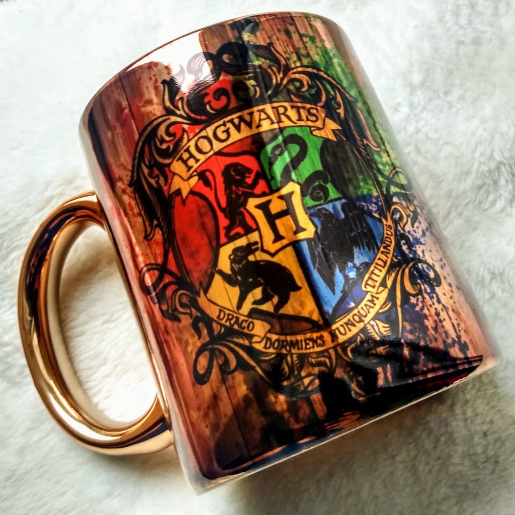 CANECA HOGWARTS HARRY POTTER DOURADA CROMADA | Shopee Brasil