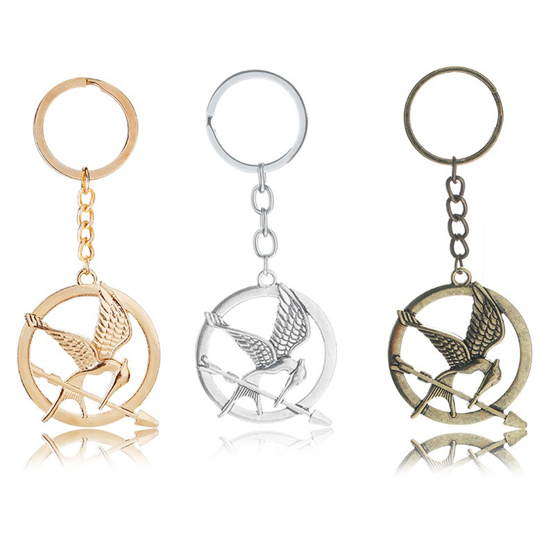 Os Jogos Vorazes Mockingjay Distintivo Chaveiro Cão Cão De P Ssaros Masculinos Do Vintage em Oferta na Shopee