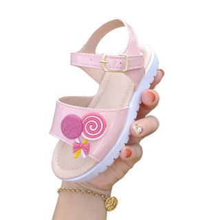 Sandália infantil feminina com enfeite pirulito .