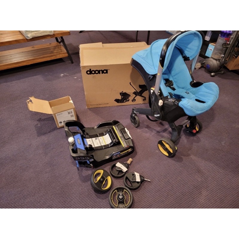 Doona Infant Car Seat, Latch Base, & New Wheels Shopee Brasil