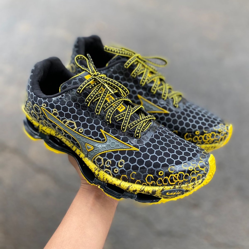 Mizuno preto e amarelo best sale