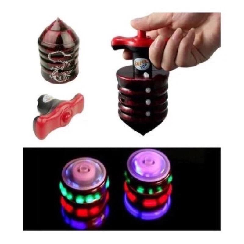 Pião Musical Luminoso Com Lançador Automatico Pião Com Luz e Som Brinquedo Infantil