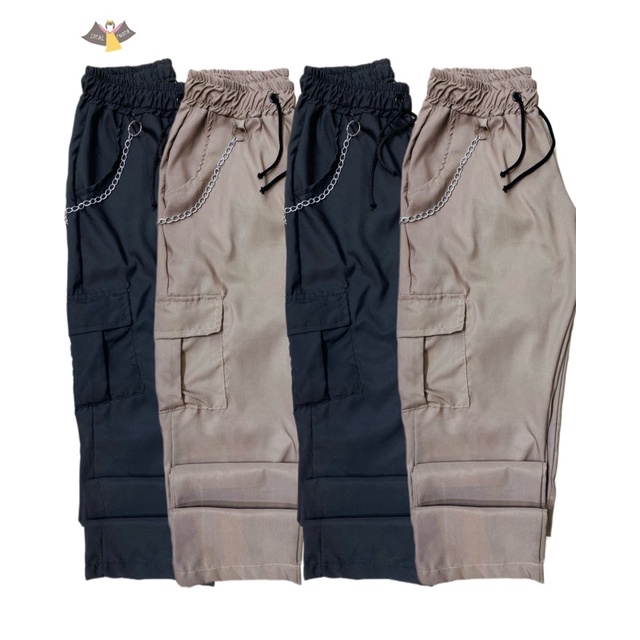 Calça cargo sem elástico no calcanhar, acompanha corrente removível corta vento/tactel - moda gringa moda blogueira