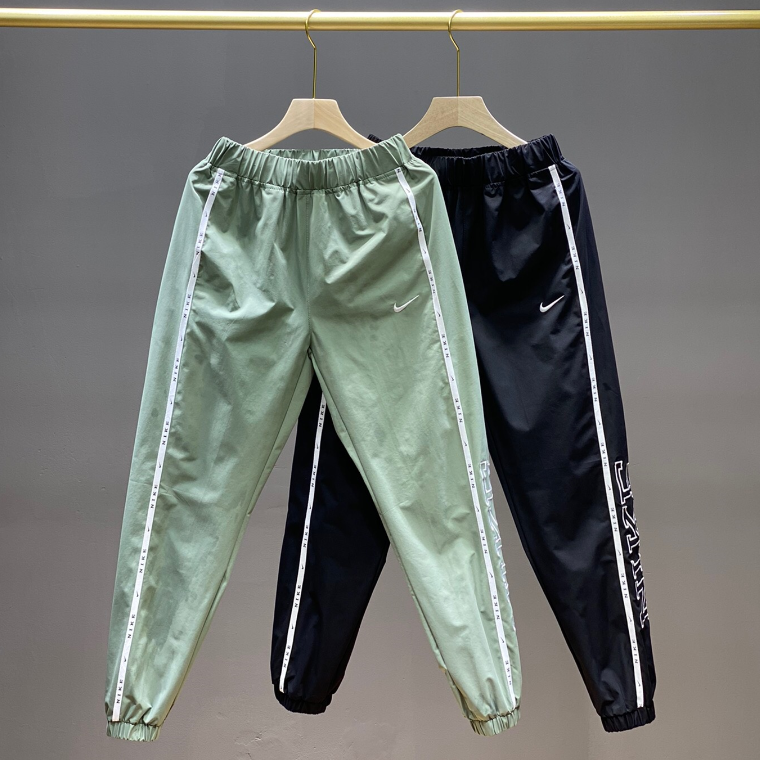 calça corta vento da nike