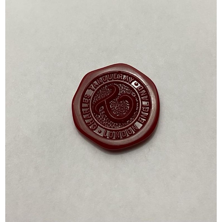 ficha/selo vermelha frontal da garrafa de gin tanqueray