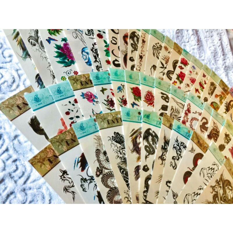 kit com 12 cartelas de tatuagens sortidas em Oferta na Shopee