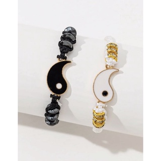 pulseira yin-yang preto branco com strass dourado
